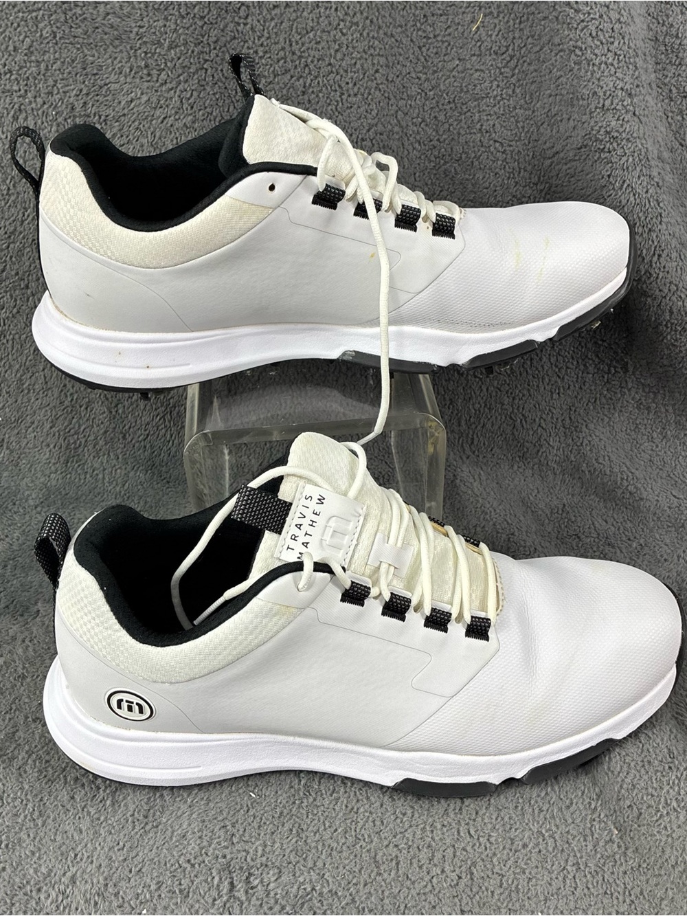 Travis Mathew Men’s White Sneakers with Black Accents